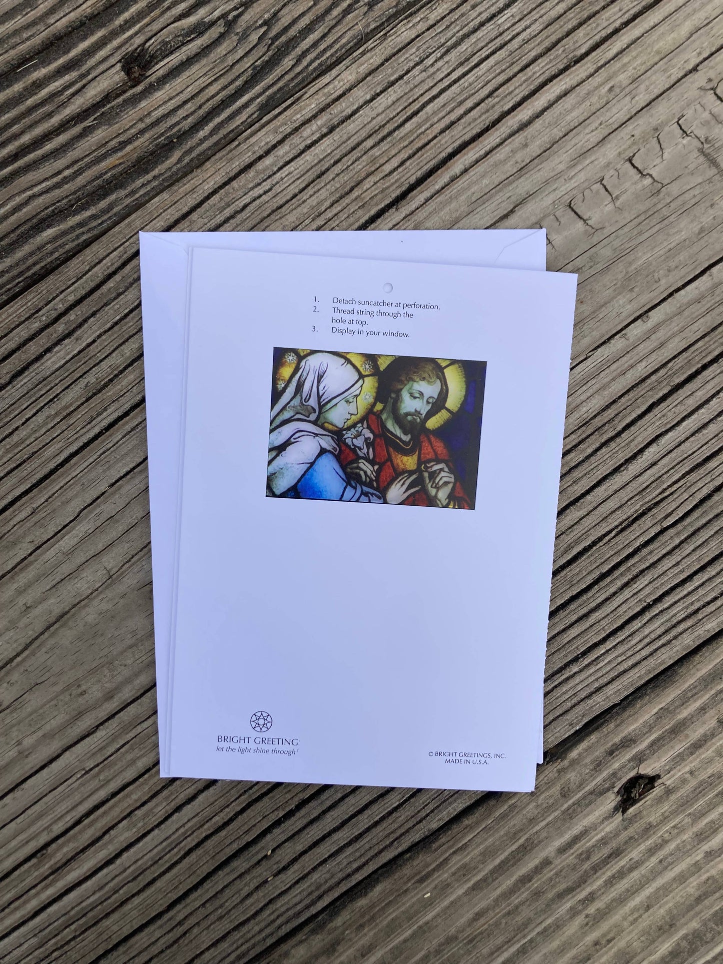 Bright Greetings - Wedding of Mary and Joseph sun-catcher greeting card.