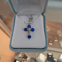 Silver Bud cross with cobalt blue stones