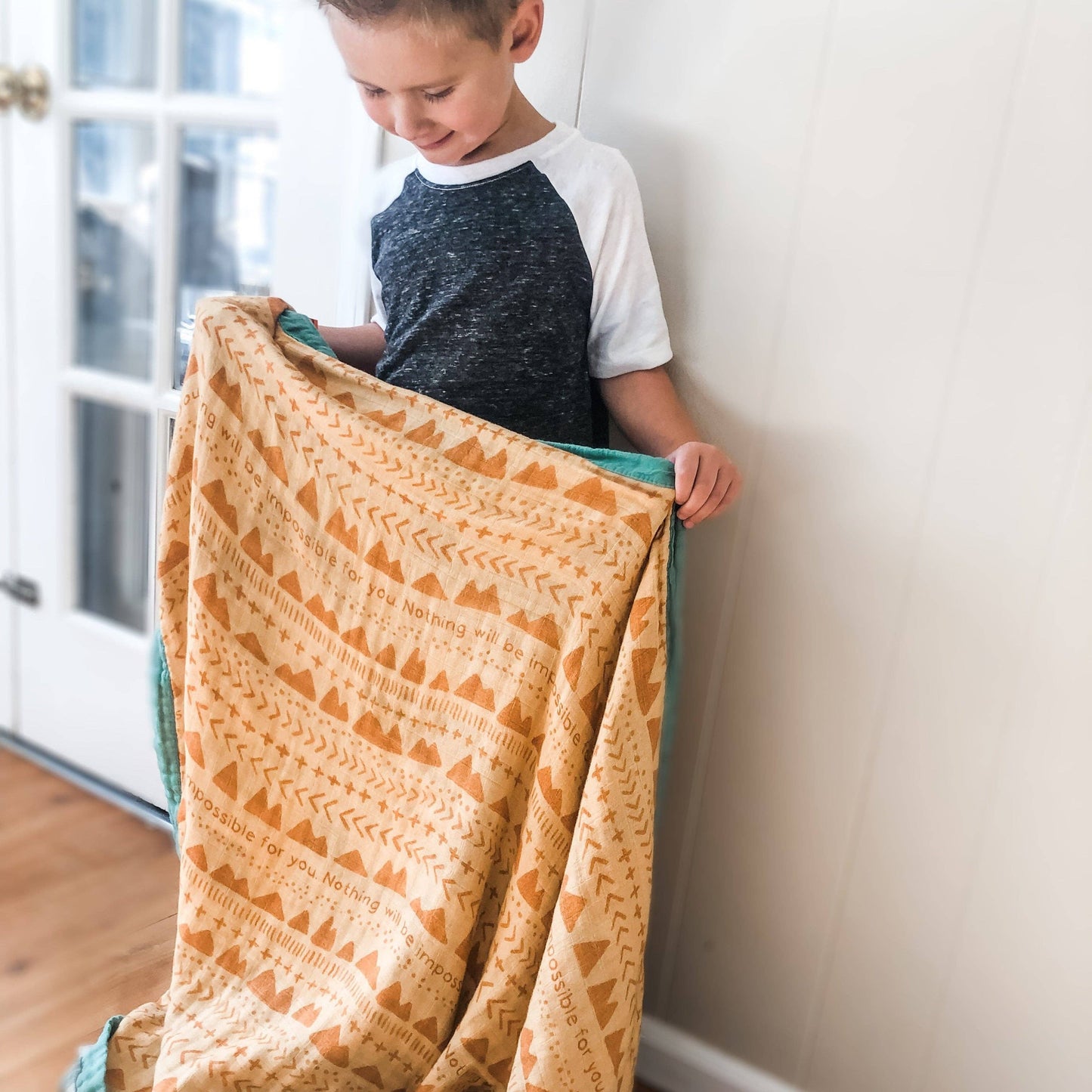 The Little Rose Shop - Catholic Luxury Double Sided Muslin Blanket - Faith Moves Mountains