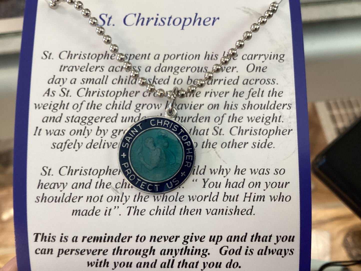 St Christopher medal on adjustable ball chain.