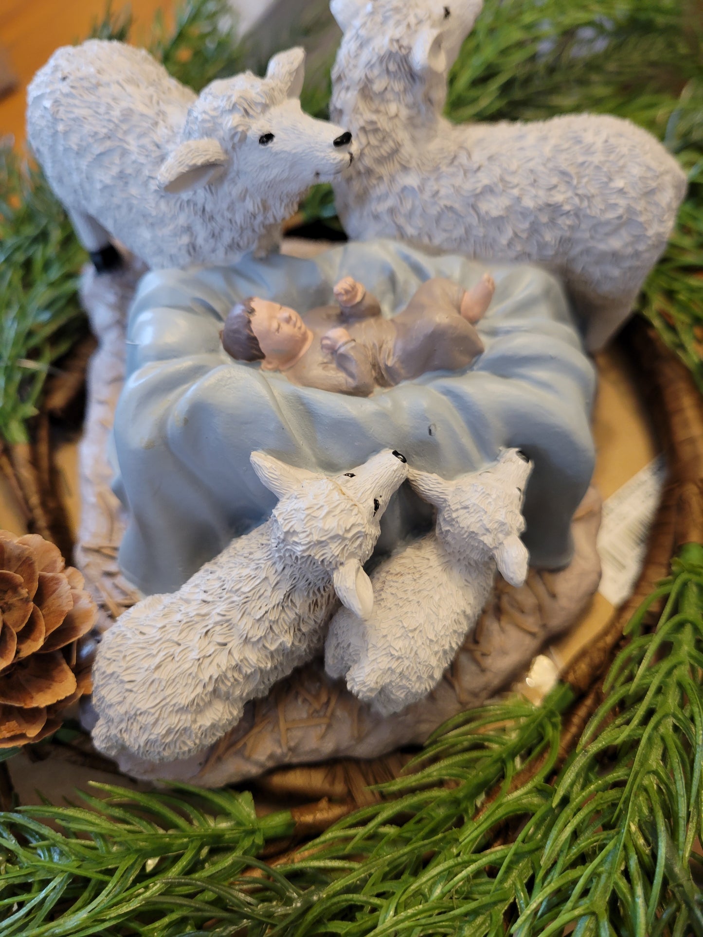 Blossom Bucket & Crossroads Home - Baby Jesus Surrounded By Sheep Figurine