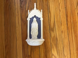 Ornate holy water font