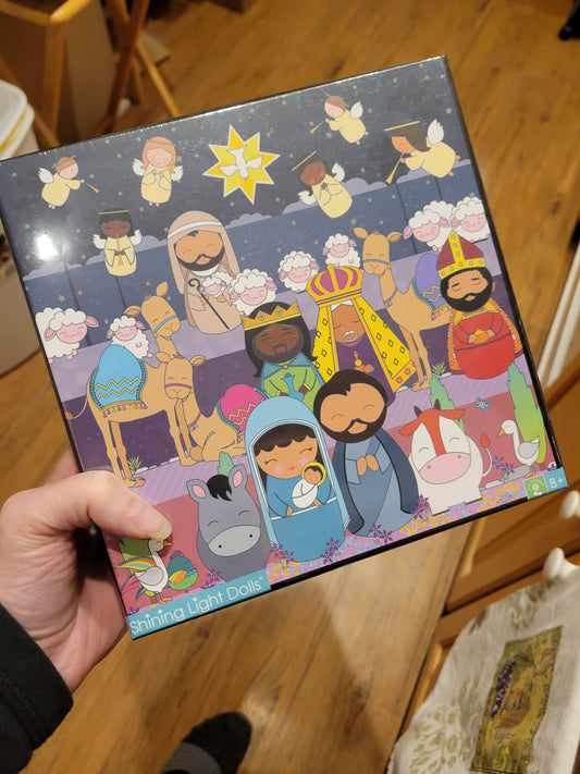 The Nativity Puzzle Shining Light Dolls